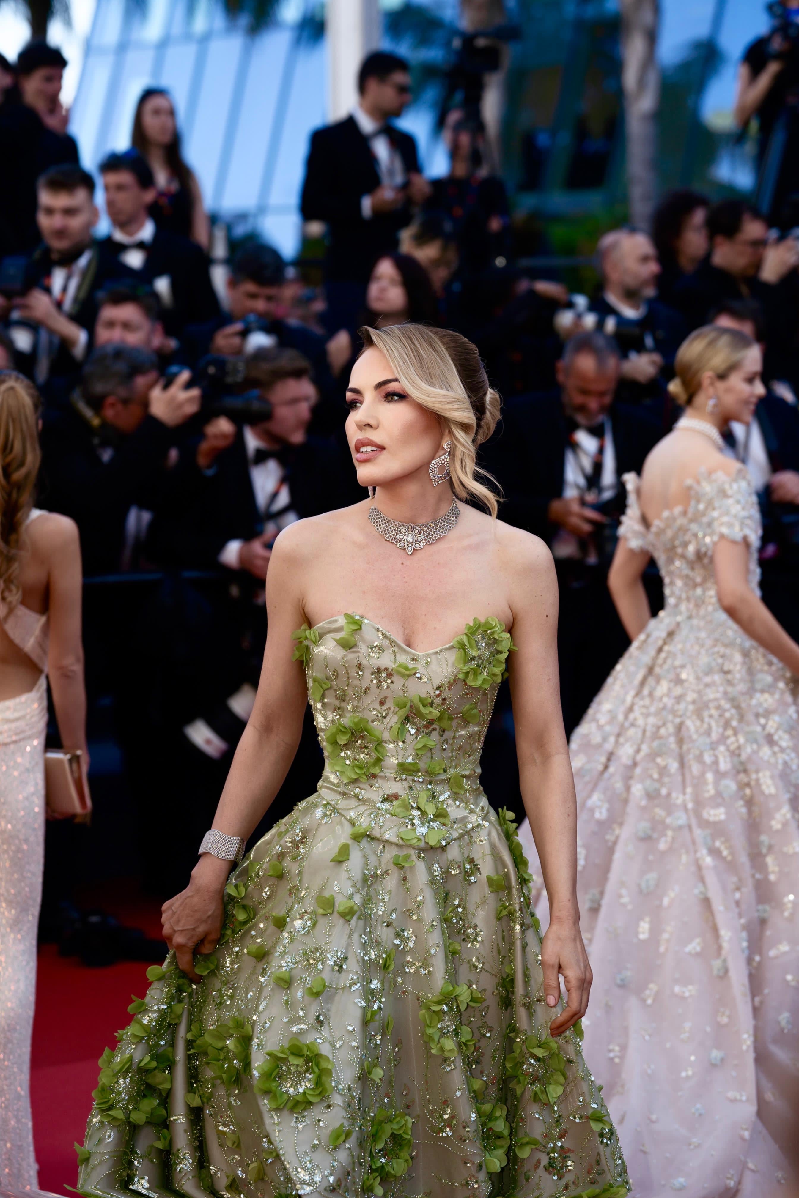 Green Summer Blossom dress crafted from liquid organza with handmade floral lace embroidery, showcased at Cannes 2024, perfect for summer events and special occasions.