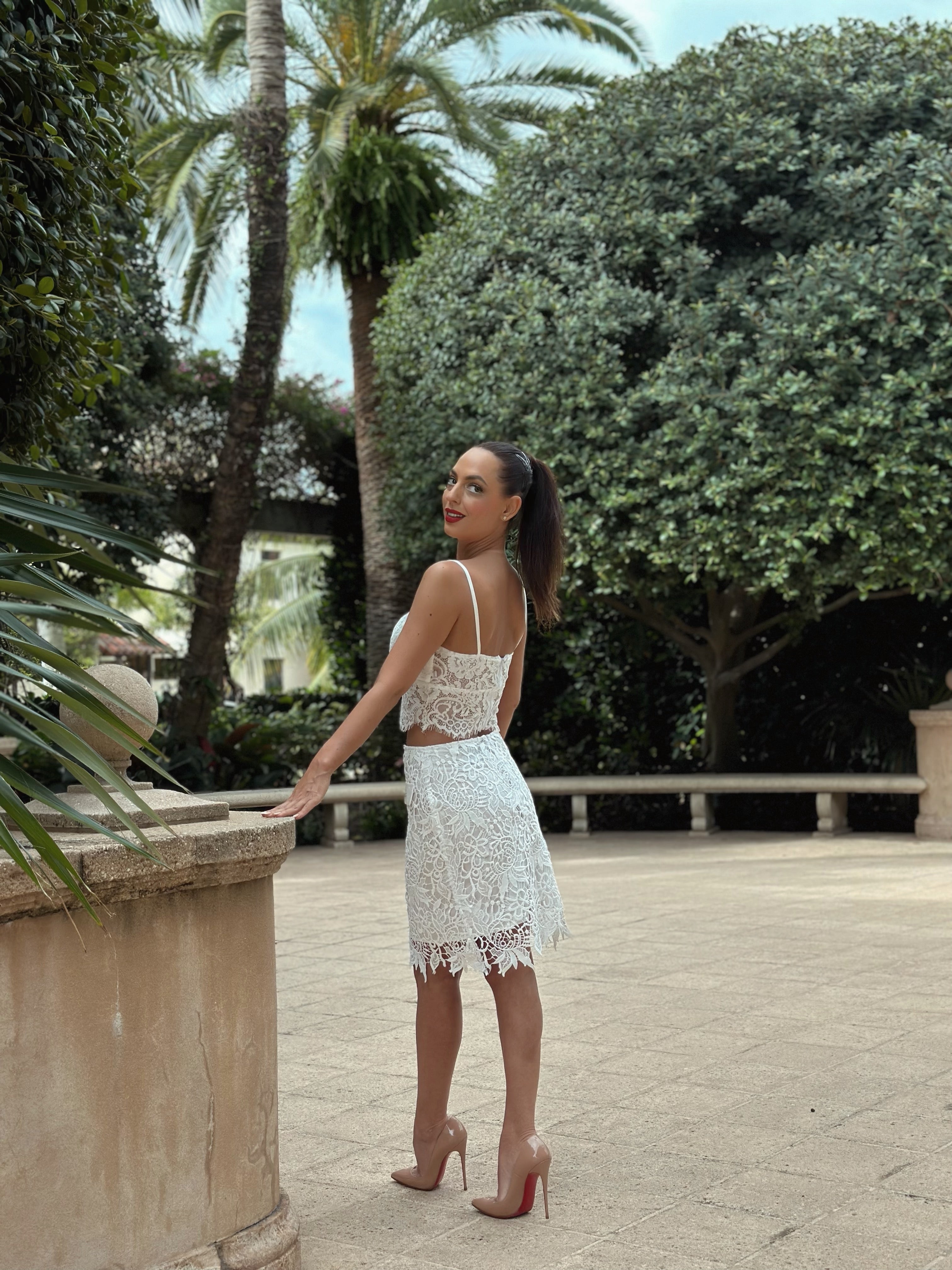 Elegant "Romance Set" featuring a lace crop top with floral patterns and scalloped hem, paired with a high-waisted lace skirt with fringed trim, perfect for garden parties and bridal events.