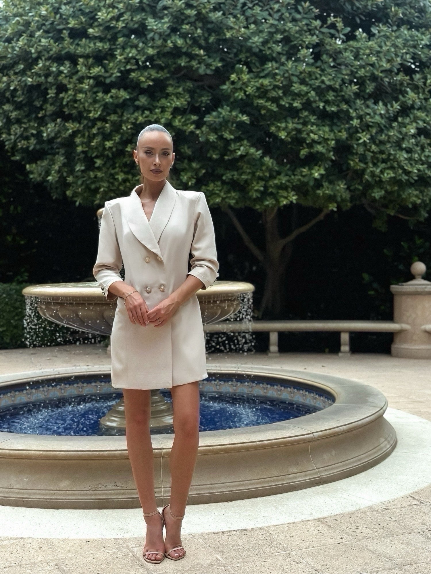 Double-breasted blazer with a luxurious satin finish, structured shoulders, and tailored fit, perfect for formal occasions, power dressing, or modern office wear
