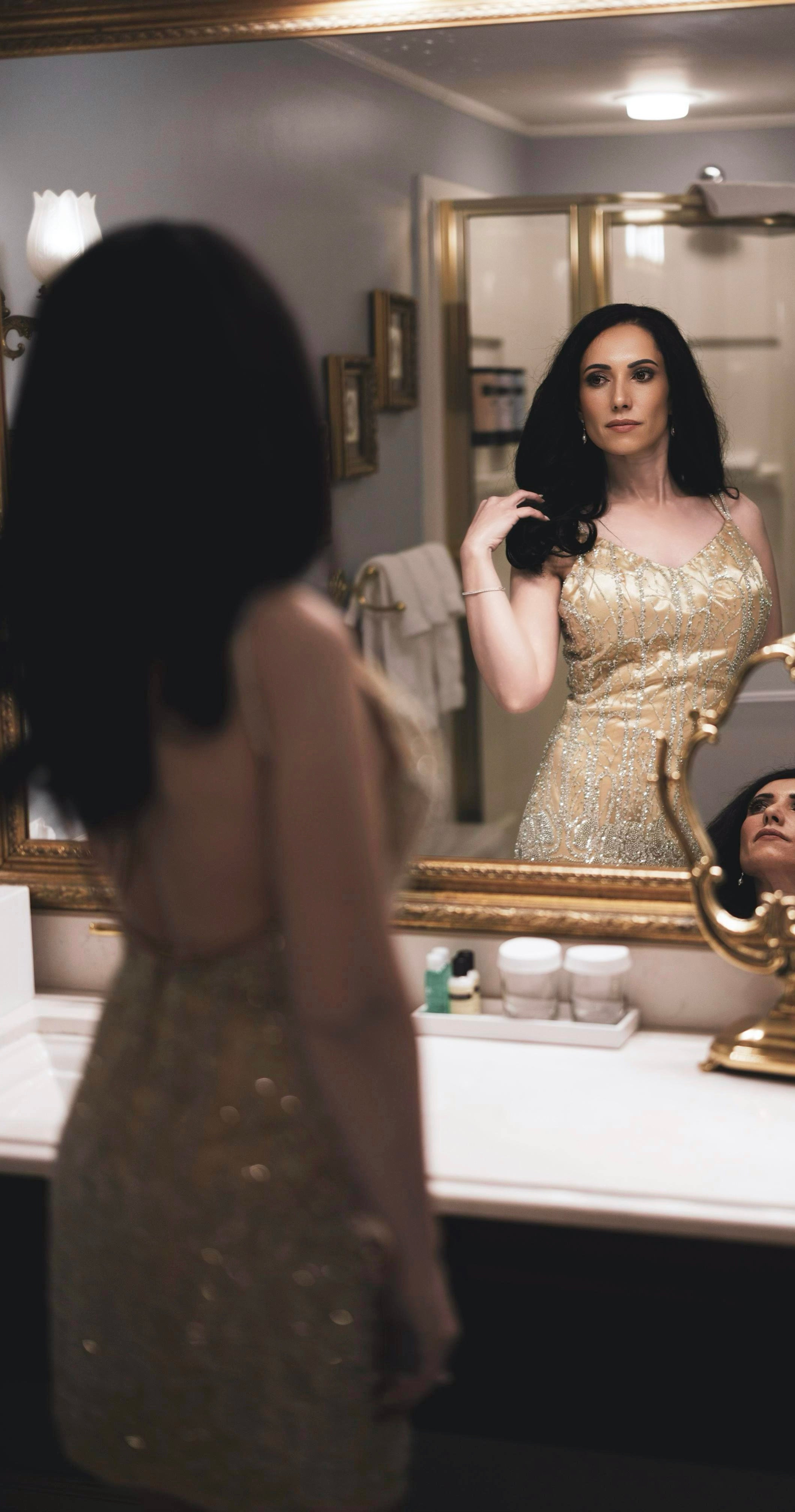 Golden short dress with a shimmering finish and chic design, perfect for parties, cocktail events, or glamorous evening wear