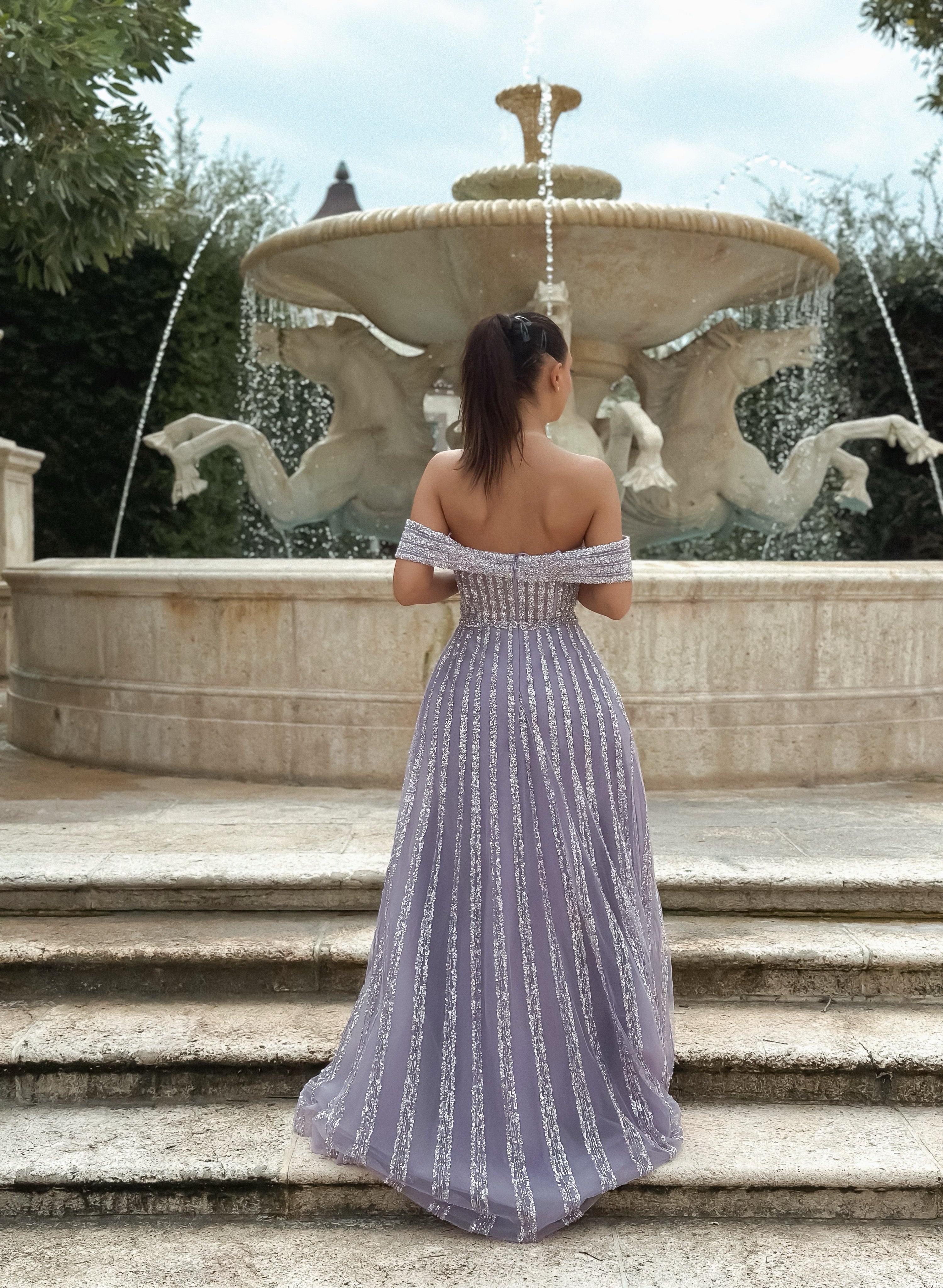 Lilac Dusk gown – Elegant lilac evening dress with a flowing silhouette, perfect for weddings, proms, and formal events. Featuring delicate fabric and a timeless design for a graceful, sophisticated look