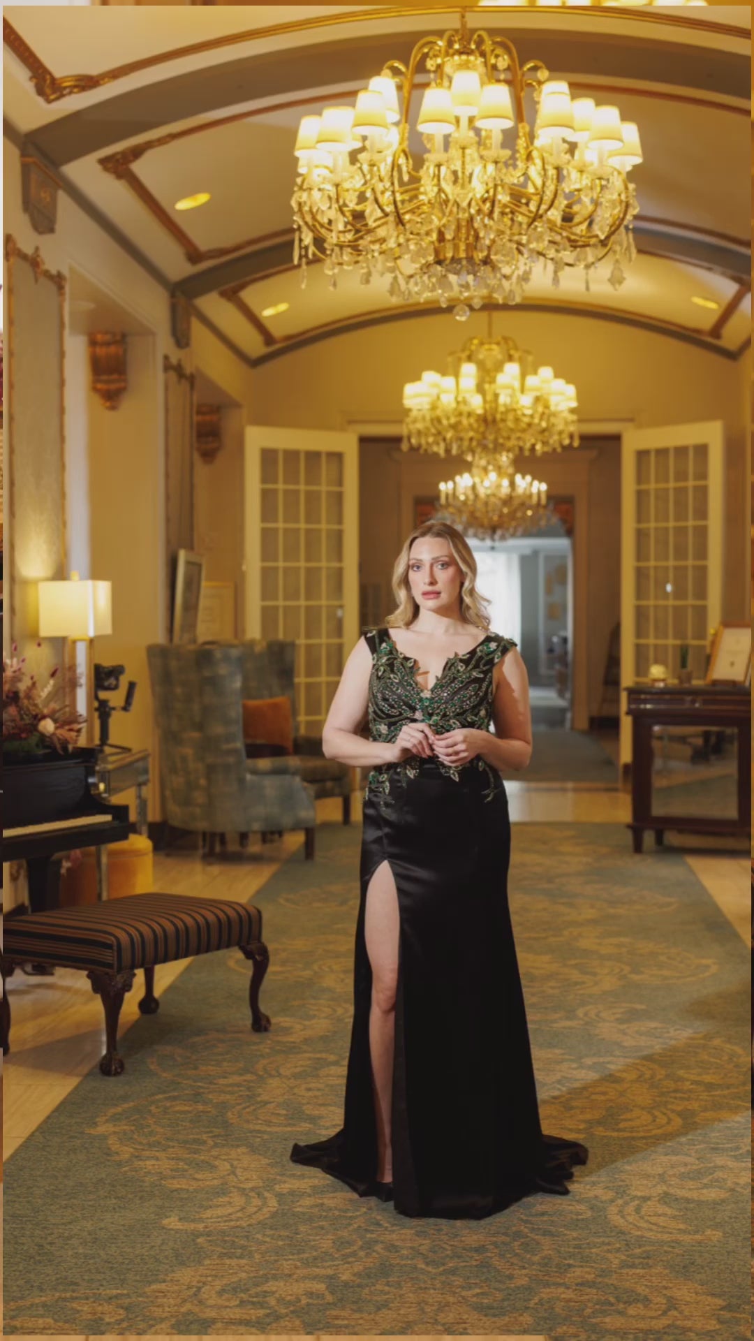 Jessica Noir black silk satin dress with intricate green stone embroidery, combining elegance and luxury for formal events, evening wear, or special occasions