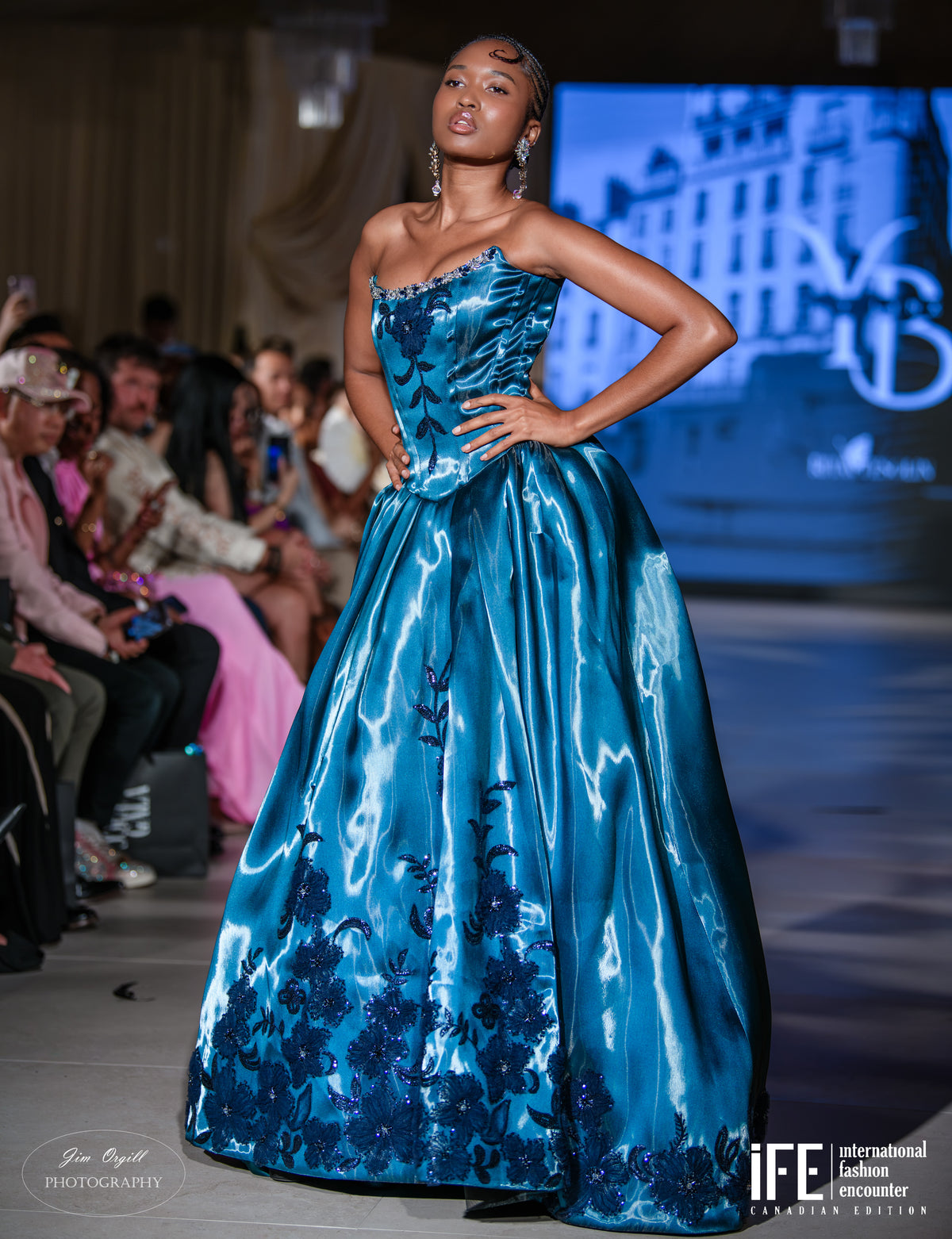 Sapphire Elegance Strapless Gown with Embellished Bodice and Appliqués